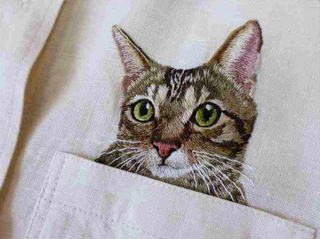Illustration for article titled Internet Cats Make Boring Dress Shirts Better